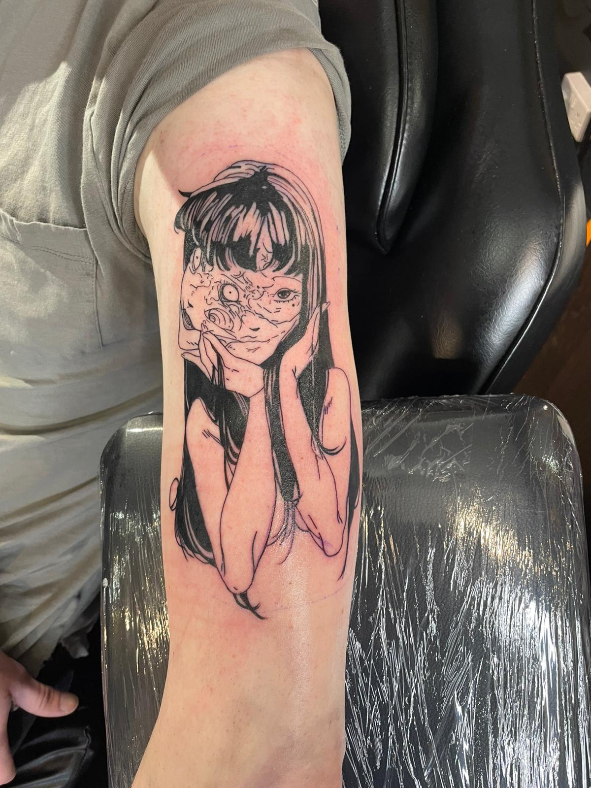 Illustrative blackwork portrait tattoo by Michael Lisney